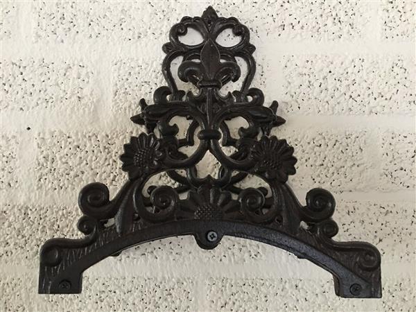 Grote foto waterslanghouder metalen houder weerbestendig gietijzer bruin tuin en terras tuindecoratie