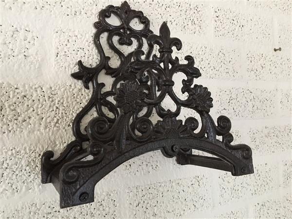 Grote foto waterslanghouder metalen houder weerbestendig gietijzer bruin tuin en terras tuindecoratie