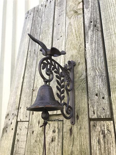 Grote foto een sierlijke deurbel met een vogel erop gemaakt van gietijzer doe het zelf en verbouw materialen en producten