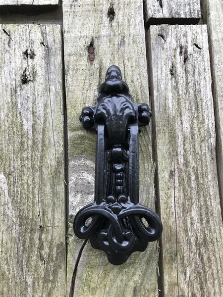 Grote foto een mooie deurklopper mat zwart heel sierlijk doe het zelf en verbouw materialen en producten