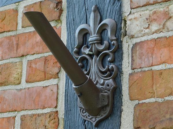 Grote foto vlaggenstokhouder met franse lelie bruin gietijzer verzamelen overige verzamelingen