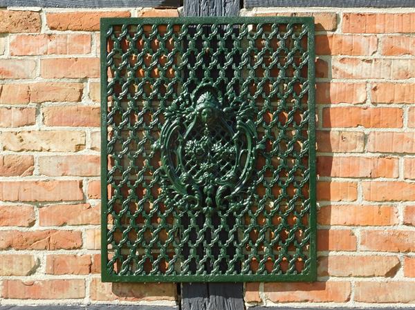 Grote foto deurrooster groen gietijzer wandornament tuin en terras tuindecoratie