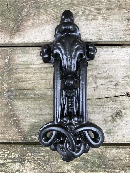 Grote foto een mooie deurklopper mat zwart heel sierlijk doe het zelf en verbouw materialen en producten