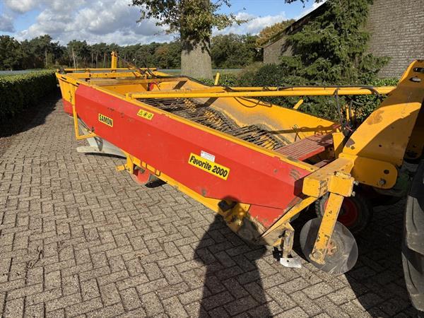 Grote foto keulmac klapper en samon rooier agrarisch oogstmachines