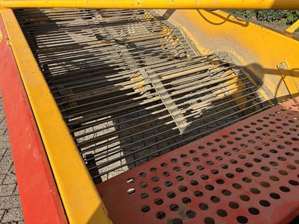 Grote foto keulmac klapper en samon rooier agrarisch oogstmachines