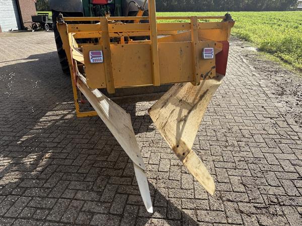 Grote foto keulmac klapper en samon rooier agrarisch oogstmachines