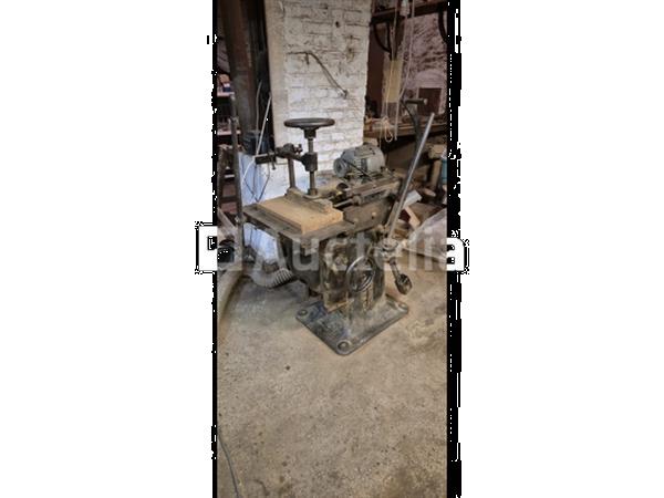 Grote foto ch debelder lontboormachine oude gemotoriseerde robuuste machine doe het zelf en verbouw ijzerwaren en bevestigingsmiddelen