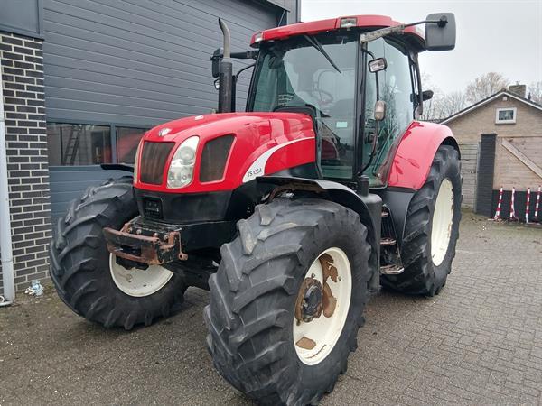 Grote foto new holland ts 135a plus met luchtremmen agrarisch tractoren