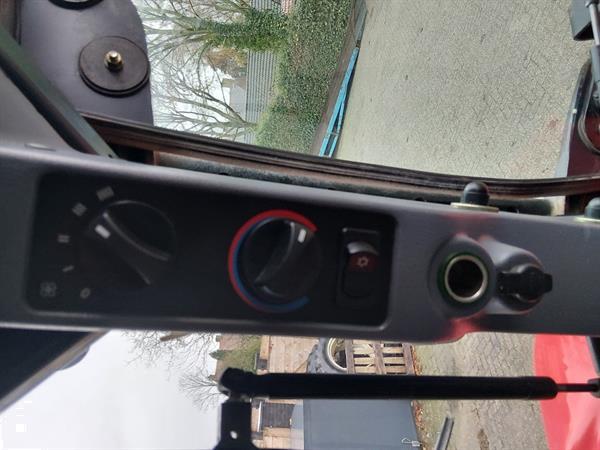 Grote foto new holland ts 135a plus met luchtremmen agrarisch tractoren