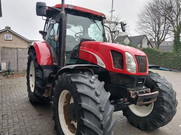 Grote foto new holland ts 135a plus met luchtremmen agrarisch tractoren