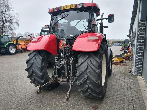 Grote foto new holland ts 135a plus met luchtremmen agrarisch tractoren
