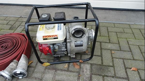 Grote foto honda wb30xt waterpomp met slangen agrarisch pompen