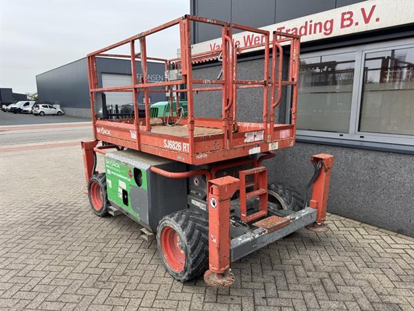 Grote foto skyjack sj 6826rt schaarhoogwerker scissor 2014 4x4 kubota 10mtr werkhoogte doe het zelf en verbouw hoogwerkers