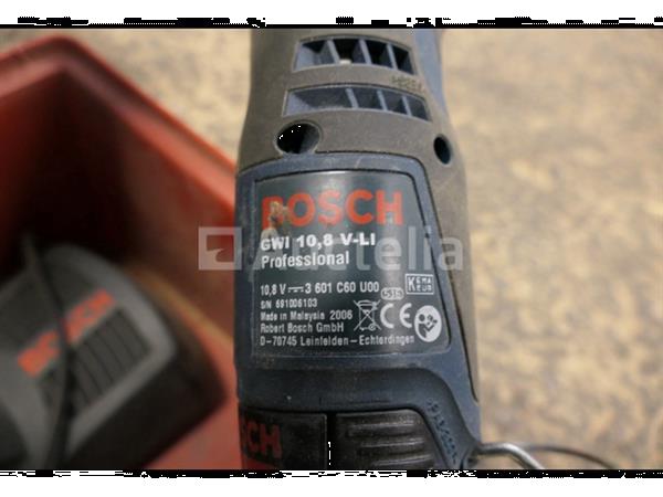 Grote foto siliconenpistool en schroevendraaier op batterijen doe het zelf en verbouw gereedschappen en machines