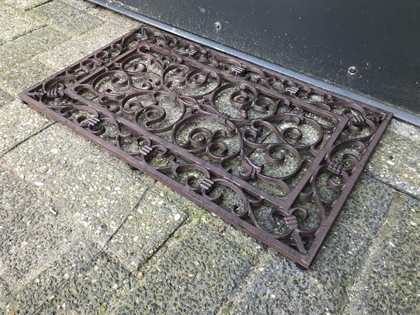 Grote foto sierlijke deurmat gemaakt van gietijzer huis en inrichting woningdecoratie