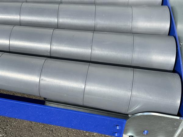 Grote foto budde aangedreven rollenbaanbocht 90 agrarisch transportbanden