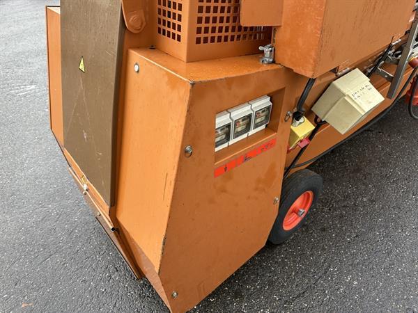 Grote foto javo standaard potmachine met dubbele pneumatische potdispenser en uitwerper agrarisch tuinbouw