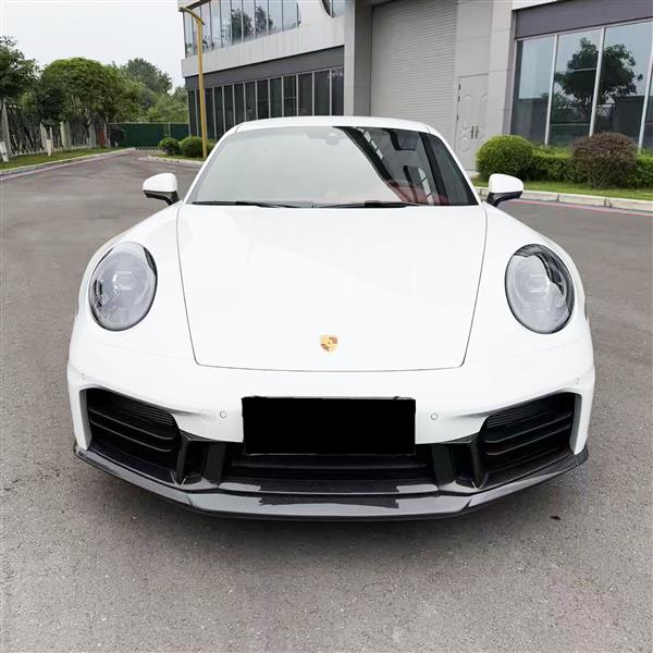 Grote foto dit betreft een porsche 992.2 carrera carbon voorlip splitter sport design vervangend model auto onderdelen tuning en styling