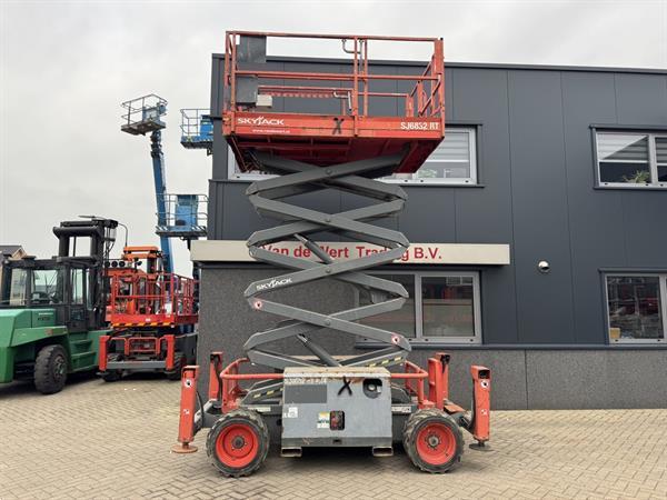 Grote foto skyjack sj 6832rt schaarhoogwerker scissor arbeitsbuhne 2015 4x4 kubota diesel 12m werkhoogte doe het zelf en verbouw hoogwerkers