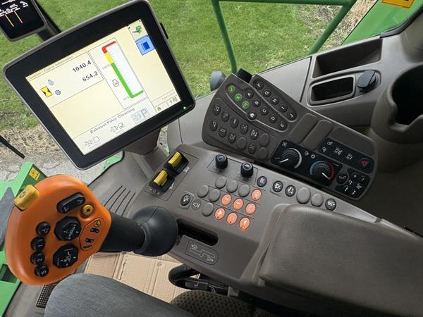 Grote foto john deere t560i agrarisch maaidorsers