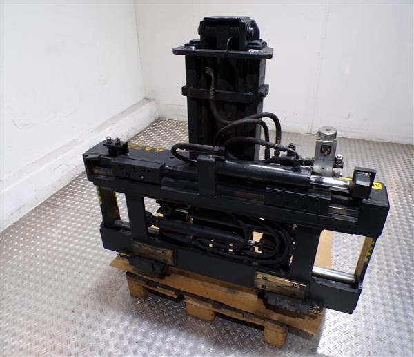 Grote foto stabau vorkversteller met containergrijper bulk containers outlet agrarisch heftrucks