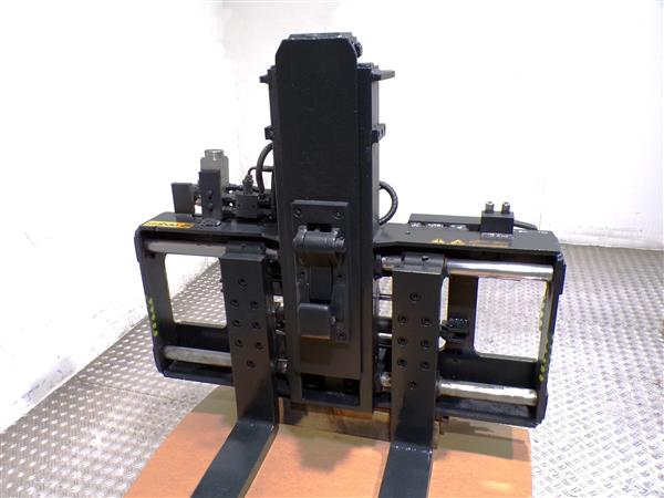 Grote foto stabau vorkversteller met containergrijper bulk containers outlet agrarisch heftrucks