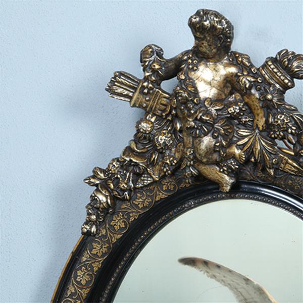 Grote foto ovale spiegel in zwart met zilver bekroond door cupido met pijlen en toorts no.362705 antiek en kunst spiegels