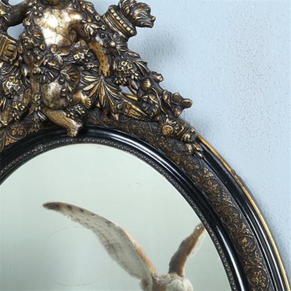 Grote foto ovale spiegel in zwart met zilver bekroond door cupido met pijlen en toorts no.362705 antiek en kunst spiegels