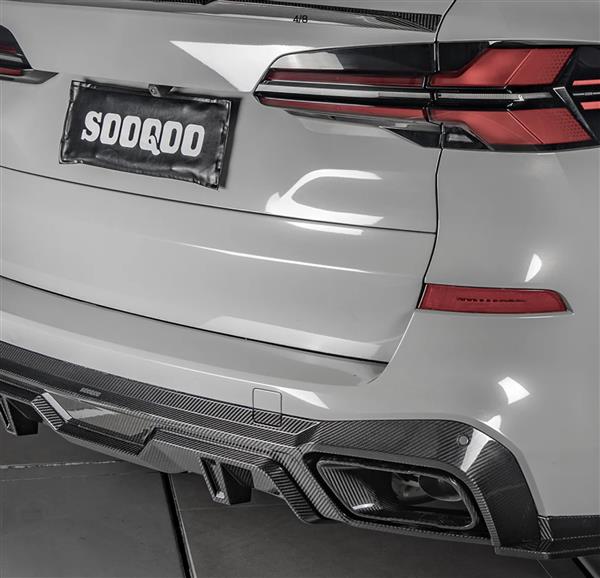 Grote foto dit betreft een set bmw x5 g05 carbon uitlaat sier stukken tips auto onderdelen tuning en styling