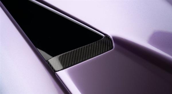 Grote foto dit betreft een lamborghini revuelto novitec carbon luchthapper achter scherm auto onderdelen tuning en styling