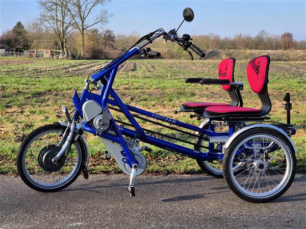 Grote foto van raam duofiets elektrische fiets fietsen en brommers elektrische fietsen
