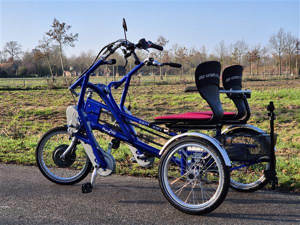 Grote foto van raam duofiets elektrische fiets fietsen en brommers elektrische fietsen