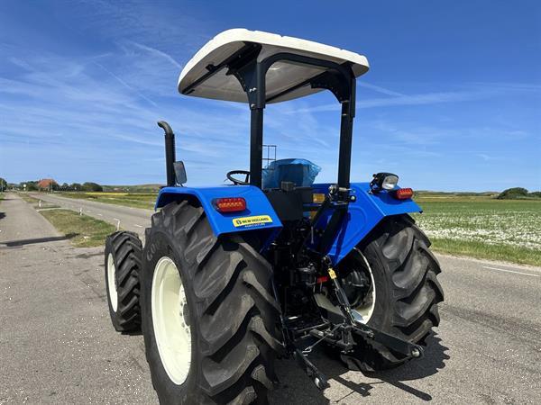 Grote foto new holland tt75 agrarisch tractoren