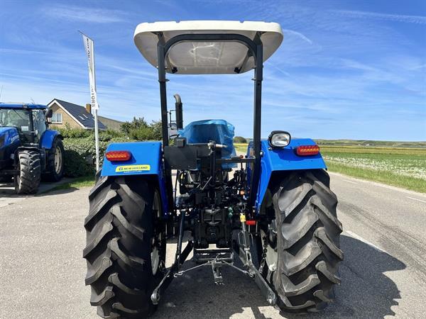 Grote foto new holland tt75 agrarisch tractoren