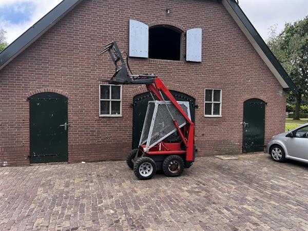 Grote foto bobcat schranklader met mestklem doe het zelf en verbouw overige doe het zelf en verbouw
