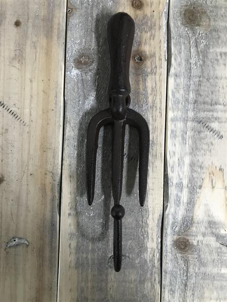 Grote foto set van 2 muurhaken voor tuingereedschap gietijzer huis en inrichting woningdecoratie