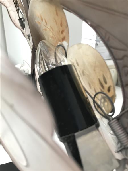 Grote foto een metalen lamp in de vorm van een papegaai heel mooi huis en inrichting overige