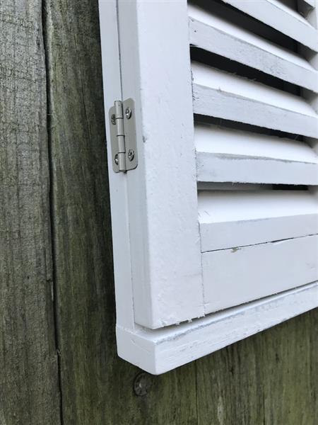 Grote foto een spiegel met openslaande deuren gemaakt van hout huis en inrichting overige