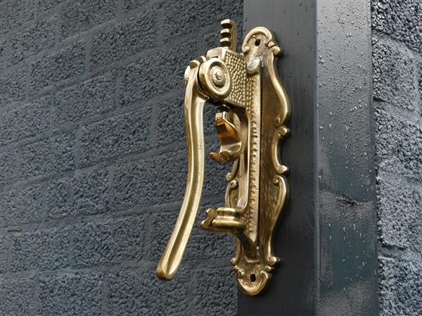 Grote foto wand wijnopener hendel kurkentrekker messing flesopener messing heel fraai laatste huis en inrichting woningdecoratie