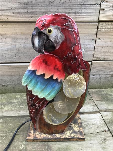 Grote foto een metalen lamp in de vorm van een papegaai heel mooi huis en inrichting overige