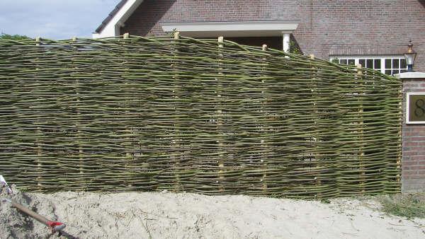 Grote foto natuurlijke schutting wilgentenen schutting tuin en terras hekken en schuttingen