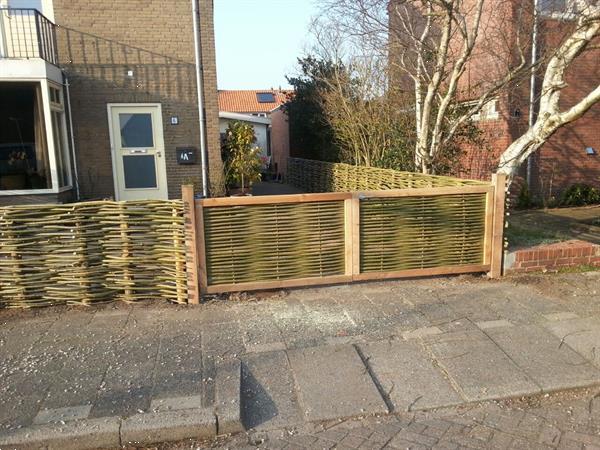 Grote foto natuurlijke schutting wilgentenen schutting tuin en terras hekken en schuttingen