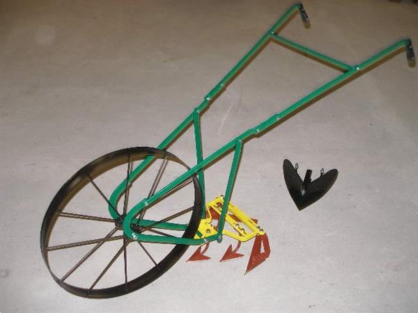 Grote foto wielschoffel schoffelmachine schoffel duwschoffel tuin en terras tuingereedschap