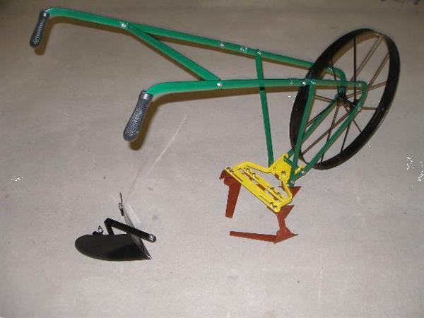 Grote foto wielschoffel schoffelmachine schoffel duwschoffel tuin en terras tuingereedschap