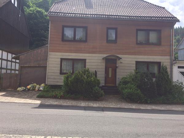 Grote foto familiehuis met winkel en 2 garagen huizen en kamers bestaand europa