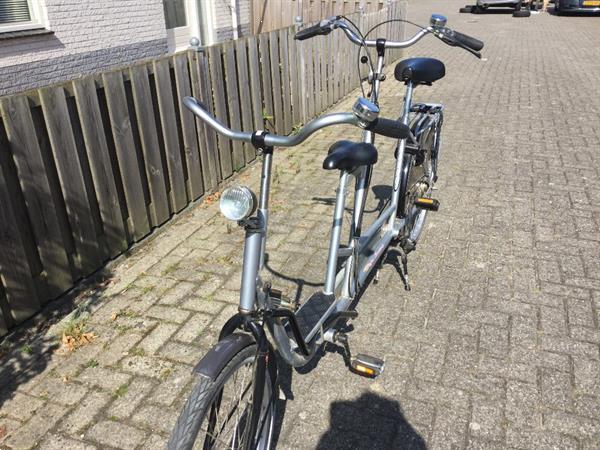 Grote foto ouder kind tandem fiets duofiets fietsen en brommers bakfietsen