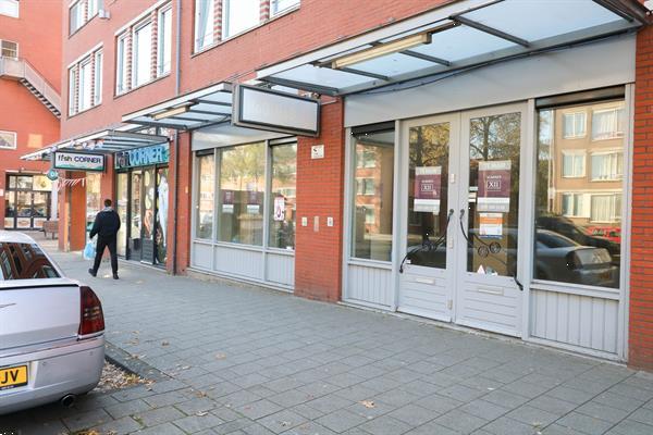 Grote foto winkel kantoor praktijkruimte aan een winkelstrip bedrijfspanden winkelruimte te huur