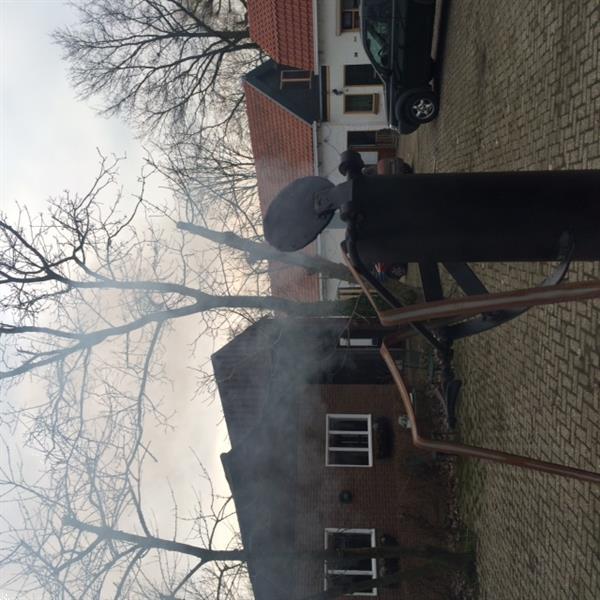 Grote foto mini tractor smoker smoker in werking agrarisch tractor toebehoren