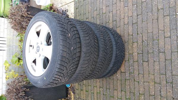 Grote foto 4 winterbanden op lichtmetalen velgen auto diversen overige accessoires