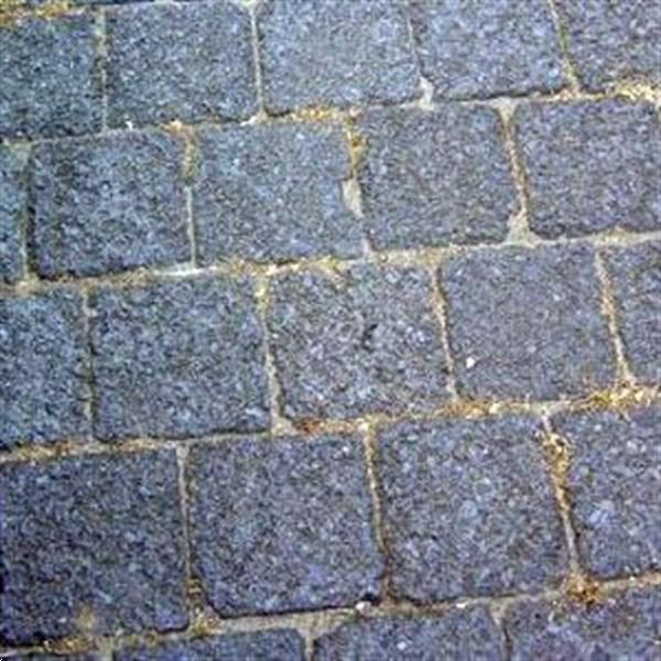 Grote foto koperslakkeien tuin en terras sierstenen en rotsen